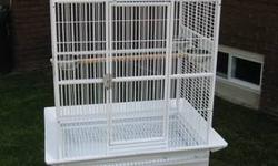 Large parrot cage, measurements are 32w x 23d x 64h, 5/8" bar spacing. Front door and feeder door locks, top opens into playtop, platform on front folds down, 3 swing out feeder doors with stainless steel cups, slide out grill and tray, rolling