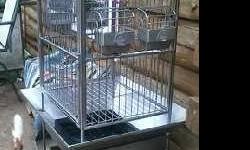 Very Nice Stainless Steel Parrot/ Amazon Bird Cage (Bird not included already sold), great for African Gray, Cockatoo, and others 1 1/4" bars. Front door swings out and locks., 4 feeder/water dishes. has bottom pan, and deluxe side catchers. Easy to