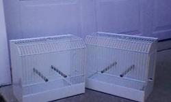 2 Finch Show Cages. White metal with wooden perches. Bought new from ABBA Seed Co. and used once at one show. Excellent condition. Will definately consider trade for Fife Canary Show Cages.