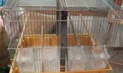 Selling HOEI finch cage. Selling complete setup cage - HOEI which is made in Japan and is a mighty fine cage. This can be one large cage/or comes with dividers to make two separate cages. Comes with water/and seed holders. The seed holder keeps the seed