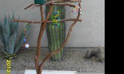 Nice perch tree / play area for your bird... base is 32 x 24 and its approx 5 -5.5 ft tall... has Green ceramic perch cups and many eye hooks for hanging toys... Exactly as pictured... call 480.593.8334 for more info.... $75 can/will deliiver....