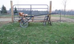 Wooden Pony/ Large mini sized. with mini size B nylon Harness.
Has trunk, & lights (if you hook a battery to them).
Shafts are 64" long, 19" wide at narrowest spot. and seat is 3' wide.
Very nice smooth riding cart.
$800
Please call 989-683-2453
I do NOT