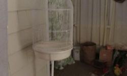 Have a nice round bird cage with stand. also have baby parakeets.$20 ea. 630-542-3385