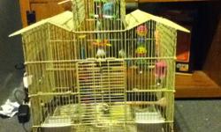 Two young blue parakeets available with their cage to a good home for $40. Includes cage and toys and some food. They aren't hand tame, but I think they could be if someone worked with them. They are still very young, under a year old. Call or email. :)