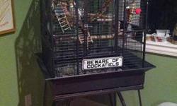 I have a tall bird cage with several doors for sale. It is red, blue and green. It has a long perch that hangs from top to bottom and swings. On wheels, easy to move. Like new!